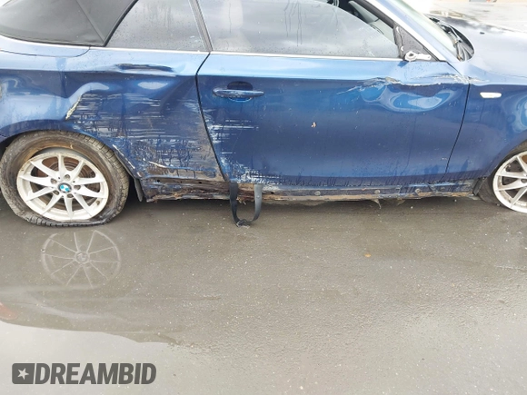 2010 BMW 1 Series 128i with VIN WBAUL7C58AVJ77695, listed as a IAAI auction lot 41938031 with Not provided miles and . Bid and sale history available at DreamBid. Image 6.