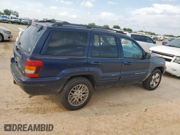 2004 Jeep Grand Cherokee with VIN 1J8GX58J54C121513, listed as a Copart auction lot 59384005 with 221,397 mi miles and Salvage title. Bid and sale history available at DreamBid. Image 3.