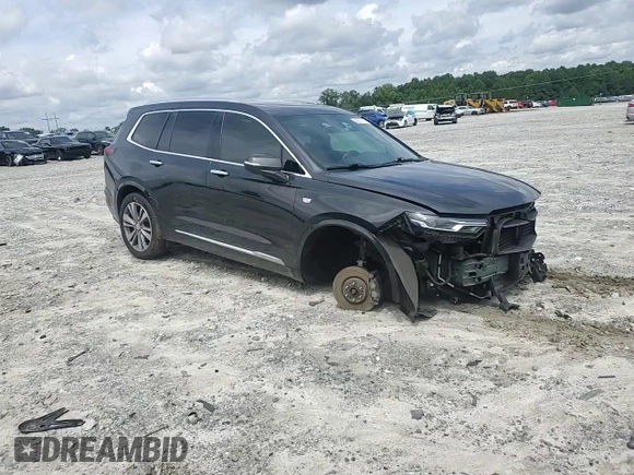 2020 Cadillac XT6 FWD Premium Luxury with VIN 1GYKPCRS9LZ205904, listed as a Copart auction lot 60575174 with 90,432 mi miles and Salvage Title. Bid and sale history available at carsss.com. Image 12.