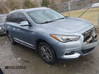2016 Infiniti QX60 with VIN 5N1AL0MM9GC504320, listed as a IAAI auction lot 41290382 with 71,358 mi miles and . Bid and sale history available at DreamBid. Image 1.