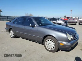 1998 Mercedes-Benz E-Class with VIN WDBJF65F1WA640092, listed as a Copart auction lot 88020155 with 239,622 mi miles and Clean Title. Bid and sale history available at carsss.com. Image 4.