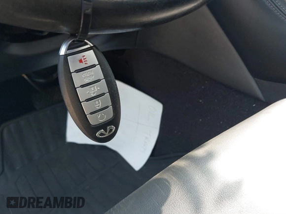 2019 Infiniti Q50 Luxe with VIN JN1EV7ARXKM557946, listed as a IAAI auction lot 40362058 with 56,615 mi miles and . Bid and sale history available at carsss.com. Image 11.