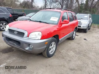 2004 Hyundai Santa Fe GLS with VIN KM8SC13D24U724643, listed as a IAAI auction lot 41908475 with 82,656 mi miles. Bid and sale history available at carsss.com. Image 2.