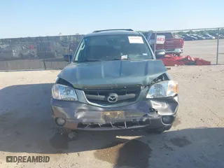 2004 Mazda Tribute ES with VIN 4F2CZ06184KM32333, listed as a IAAI auction lot 42041183 with 33,646 mi miles. Bid and sale history available at carsss.com. Image 12.