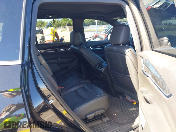2020 Cadillac XT6 FWD Premium Luxury with VIN 1GYKPCRS7LZ211197, listed as a IAAI auction lot 42231424 with 57,351 mi miles and . Bid and sale history available at DreamBid. Image 8.
