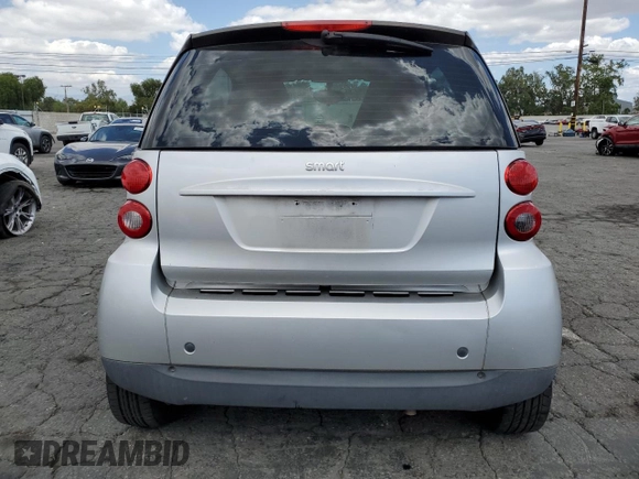 2009 Smart fortwo Pure with VIN WMEEJ31X89K251402, listed as a Copart auction lot 56791545 with 52,636 mi miles and Clean title. Bid and sale history available at DreamBid. Image 6.