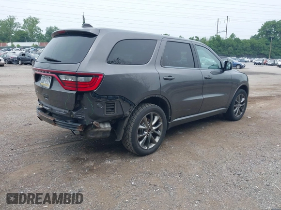 2014 Dodge Durango SXT z VIN 1C4RDJAG0EC562127, wystawiony jako IAAI lot #42456152 z przebiegiem 124 171 mil mil oraz . Historia ofert i sprzedaży dostępna na DreamBid. Obrazek 4.