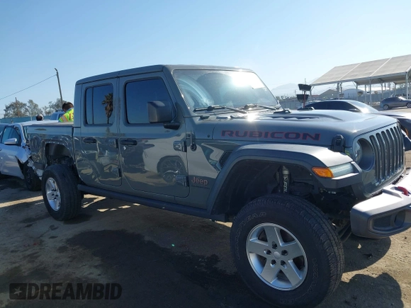 2020 Jeep Gladiator Rubicon with VIN 1C6JJTBG6LL149469, listed as a IAAI auction lot 42224826 with 58,870 mi miles and . Bid and sale history available at DreamBid. Image 14.