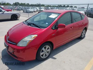 2007 Toyota Prius with VIN JTDKB20U873275903, listed as a IAAI auction lot 42392166 with 169,938 mi miles and . Bid and sale history available at DreamBid. Image 2.