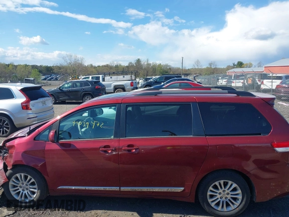 2014 Toyota Sienna XLE with VIN 5TDYK3DC8ES457940, listed as a IAAI auction lot 42039472 with 99,769 mi miles and . Bid and sale history available at DreamBid. Image 14.