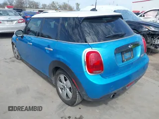 2017 MINI Hardtop 4 Door Cooper with VIN WMWXU1C53H2E17614, listed as a IAAI auction lot 41686204 with 53,409 mi miles and . Bid and sale history available at DreamBid. Image 3.