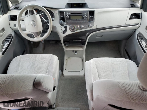 2012 Toyota Sienna with VIN 5TDKA3DC0CS014719, listed as a Copart auction lot 88358865 with 118,901 mi miles and Salvage Title. Bid and sale history available at DreamBid. Image 8.