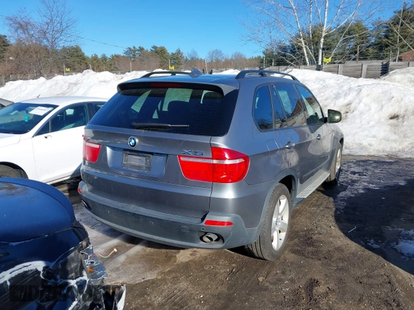 2010 BMW X5 35d with VIN 5UXFF0C54ALT77185, listed as a IAAI auction lot 41699375 with 151,770 mi miles. Bid and sale history available at carsss.com. Image 4.