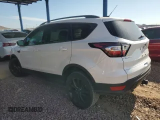 2017 Ford Escape SE z VIN 1FMCU9G97HUC26806, wystawiony jako Copart lot #65464674 z przebiegiem 93 023 mil mil oraz Szkoda całkowita • Salvage title. Historia ofert i sprzedaży dostępna na DreamBid. Obrazek 2.