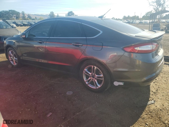 2015 Ford Fusion Energi Titanium with VIN 3FA6P0SUXFR214059, listed as a Copart auction lot 80802444 with 109,999 mi miles and Salvage Title. Bid and sale history available at carsss.com. Image 2.