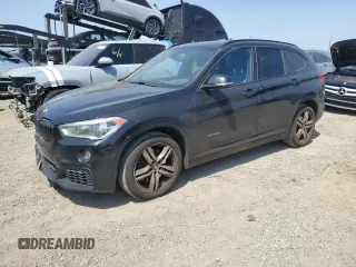2017 BMW X1 xDrive28i with VIN WBXHT3C36H5F71076, listed as a Copart auction lot 59814145 with 115,012 mi miles and Salvage title. Bid and sale history available at DreamBid. Image 1.