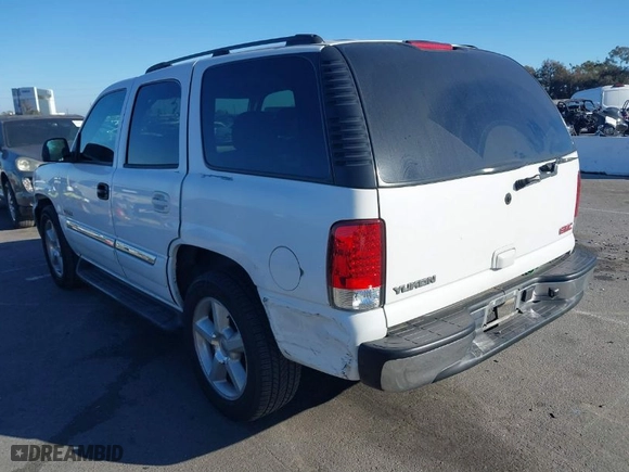 2004 GMC Yukon SLT with VIN 1GKEC13T64R289853, listed as a IAAI auction lot 41668408 with 163,829 mi miles. Bid and sale history available at carsss.com. Image 3.