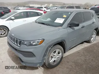 2023 Jeep Compass Sport with VIN 3C4NJDAN0PT572381, listed as a IAAI auction lot 41790372 with 28,827 mi miles and . Bid and sale history available at DreamBid. Image 2.
