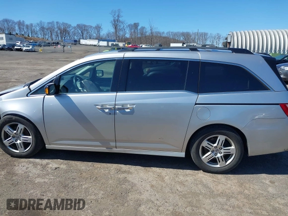 2012 Honda Odyssey Touring with VIN 5FNRL5H93CB042392, listed as a IAAI auction lot 41859533 with 169,141 mi miles. Bid and sale history available at carsss.com. Image 14.