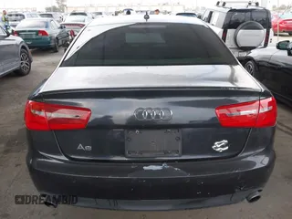 2014 Audi A6 Premium Plus z VIN WAUGFAFC7EN025053, wystawiony jako IAAI lot #42131033 z przebiegiem 154 552 mil mil oraz . Historia ofert i sprzedaży dostępna na DreamBid. Obrazek 16.
