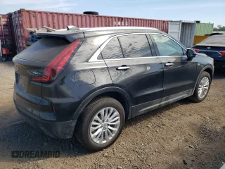2024 Cadillac XT4 AWD Luxury with VIN 1GYFZBR4XRF199970, listed as a Copart auction lot 71496774 with 4,512 mi miles and Salvage Title. Bid and sale history available at carsss.com. Image 3.