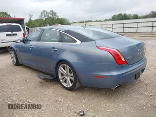 2013 Jaguar XJ with VIN SAJWA2G17DLV57561, listed as a IAAI auction lot 41928575 with 108,794 mi miles. Bid and sale history available at carsss.com. Image 3.