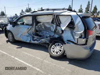 2014 Toyota Sienna XLE with VIN 5TDYK3DC7ES523796, listed as a Copart auction lot 52195795 with 0 mi miles and Salvage Title. Bid and sale history available at carsss.com. Image 2.