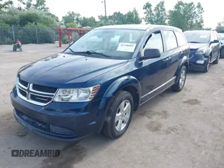 2013 Dodge Journey American Value with VIN 3C4PDCAB2DT529530, listed as a IAAI auction lot 42798001 with Not provided miles and . Bid and sale history available at DreamBid. Image 2.