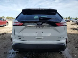 2020 Ford Edge SE z VIN 2FMPK3G98LBB42724, wystawiony jako Copart lot #49602455 z przebiegiem Nie podano mil oraz Nie do naprawy • Non repairable. Historia ofert i sprzedaży dostępna na DreamBid. Obrazek 6.