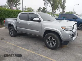 2016 Toyota Tacoma SR5 z VIN 3TMAZ5CN1GM014351, wystawiony jako IAAI lot #42357717 z przebiegiem 116 712 mil mil oraz . Historia ofert i sprzedaży dostępna na DreamBid. Obrazek 1.