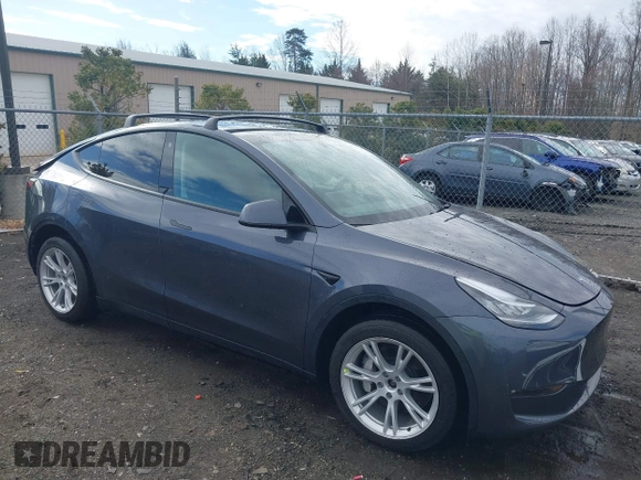 2023 Tesla Model Y Long Range with VIN 7SAYGDEE8PF599254, listed as a IAAI auction lot 41718342 with 24,339 mi miles and . Bid and sale history available at carsss.com. Image 1.