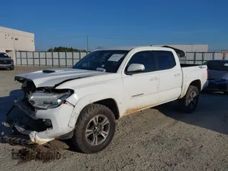 2018 Toyota Tacoma SR5 with VIN 3TMAZ5CN4JM062272, listed as a IAAI auction lot 41671472 with 114,566 mi miles and . Bid and sale history available at DreamBid. Image 6.