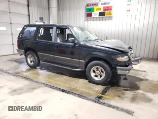 1998 Ford Explorer XLT with VIN 1FMZU32P3WUA37001, listed as a Copart auction lot 50911365 with Not provided miles and Salvage title. Bid and sale history available at DreamBid. Image 4.