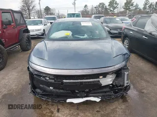 2024 Lucid Air Touring with VIN 50EA1TEA4RA004799, listed as a IAAI auction lot 41651768 with 7,779 mi miles. Bid and sale history available at carsss.com. Image 12.