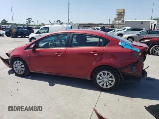 2015 Kia Rio LX with VIN KNADM4A30F6501897, listed as a Copart auction lot 52390015 with 83,631 mi miles and Salvage Title. Bid and sale history available at carsss.com. Image 2.