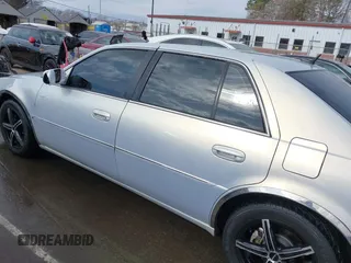 2006 Cadillac DTS w/1SC with VIN 1G6KD57Y56U101903, listed as a IAAI auction lot 41710160 with 151,057 mi miles. Bid and sale history available at carsss.com. Image 14.