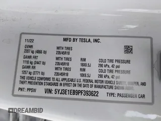 2023 Tesla Model 3 Long Range with VIN 5YJ3E1EB9PF393622, listed as a IAAI auction lot 41207132 with 14,097 mi miles and . Bid and sale history available at DreamBid. Image 9.