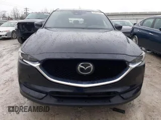 2021 Mazda CX-5 Signature with VIN JM3KFBEY8M0436075, listed as a Copart auction lot 85061194 with 66,471 mi miles and Salvage Title. Bid and sale history available at carsss.com. Image 5.