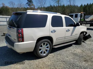 2013 GMC Yukon Denali with VIN 1GKS2EEF0DR326058, listed as a Copart auction lot 50707535 with 156,764 mi miles and Salvage Title. Bid and sale history available at carsss.com. Image 3.