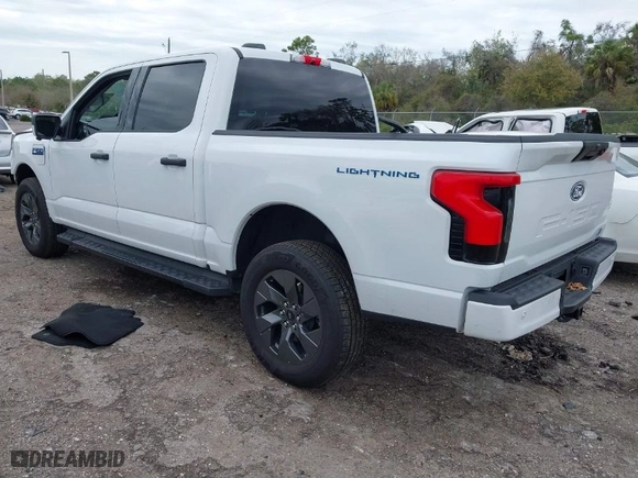 2024 Ford F-150 Lightning XLT with VIN 1FTVW3LKXRWG01185, listed as a IAAI auction lot 41679606 with NaN miles. Bid and sale history available at carsss.com. Image 3.