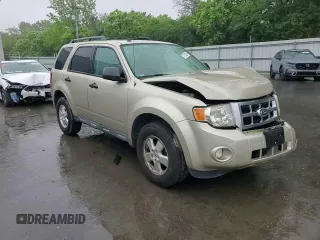 2012 Ford Escape XLT z VIN 1FMCU9DG1CKC74602, wystawiony jako Copart lot #57764325 z przebiegiem 153 872 mil mil oraz Szkoda całkowita • Salvage title. Historia ofert i sprzedaży dostępna na DreamBid. Obrazek 14.