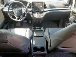 2023 Honda Odyssey Touring with VIN 5FNRL6H89PB053593, listed as a Copart auction lot 64836685 with 26,568 mi miles and Salvage title. Bid and sale history available at DreamBid. Image 8.