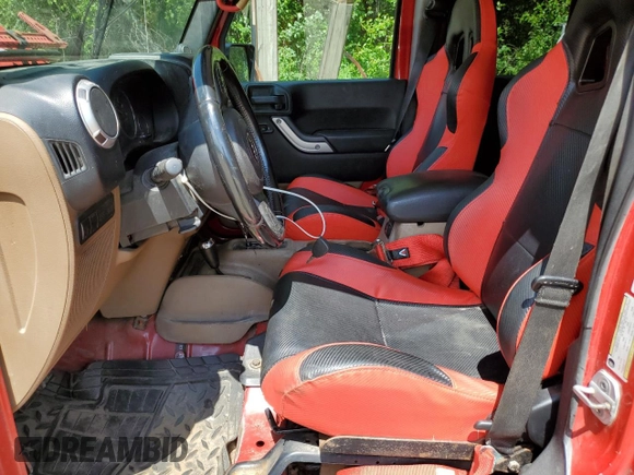 2011 Jeep Wrangler Unlimited Rubicon with VIN 1J4HA6H14BL537000, listed as a Copart auction lot 60863105 with 189,307 mi miles and Clean title. Bid and sale history available at DreamBid. Image 7.