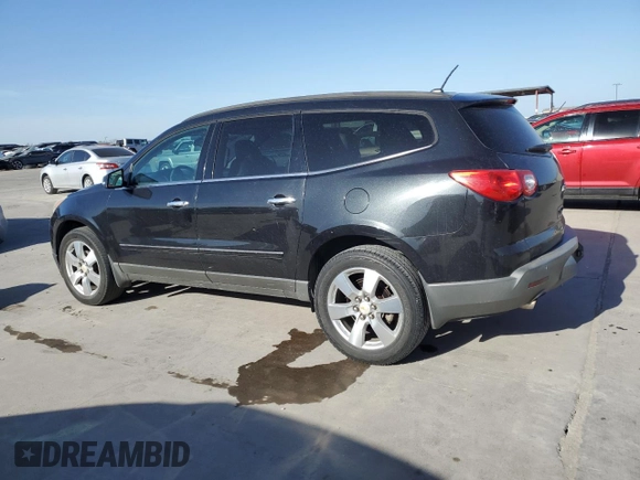 2012 Chevrolet Traverse LTZ z VIN 1GNKRLED7CJ261692, wystawiony jako Copart lot #49294845 z przebiegiem 207 616 mil mil oraz Czysty tytuł • Clean title. Historia ofert i sprzedaży dostępna na DreamBid. Obrazek 2.