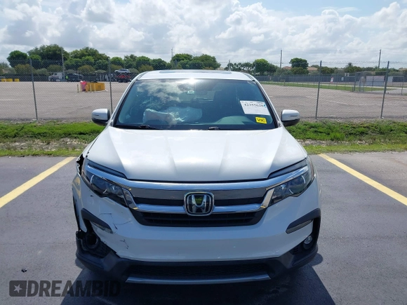 2020 Honda Pilot EX-L with VIN 5FNYF5H59LB028268, listed as a IAAI auction lot 42355620 with 107,033 mi miles and . Bid and sale history available at DreamBid. Image 12.