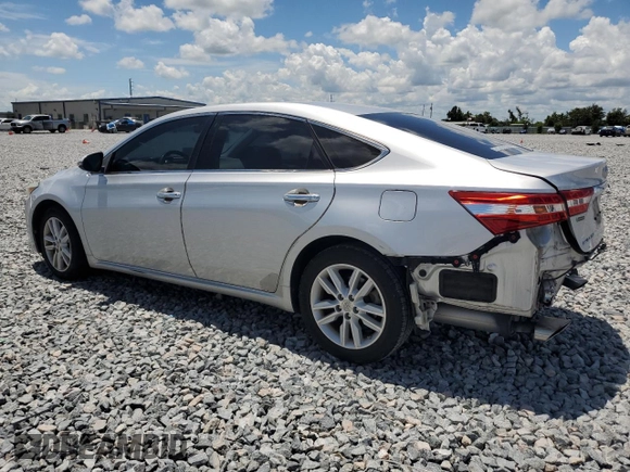 2013 Toyota Avalon XLE with VIN 4T1BK1EB6DU037938, listed as a Copart auction lot 62709525 with 104,616 mi miles and Salvage title. Bid and sale history available at DreamBid. Image 2.