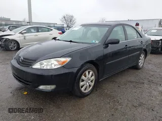 2003 Toyota Camry LE with VIN 4T1BE30K13U144114, listed as a IAAI auction lot 41829879 with 60,385 mi miles and . Bid and sale history available at DreamBid. Image 17.