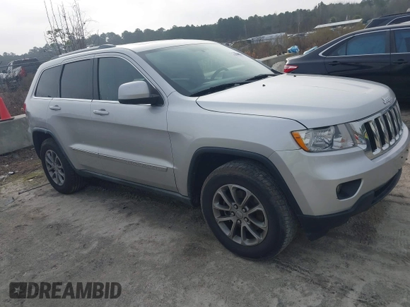 2012 Jeep Grand Cherokee Laredo with VIN 1C4RJFAG7CC189381, listed as a IAAI auction lot 41429085 with 137,238 mi miles. Bid and sale history available at carsss.com. Image 1.