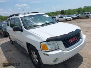 2003 GMC Envoy XL SLE with VIN 1GKES16S136153880, listed as a IAAI auction lot 42009798 with 289,208 mi miles. Bid and sale history available at carsss.com. Image 1.