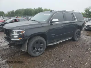 2015 Chevrolet Tahoe LTZ with VIN 1GNSKCKC5FR552097, listed as a Copart auction lot 59510635 with 183,760 mi miles and Salvage title. Bid and sale history available at DreamBid. Image 1.